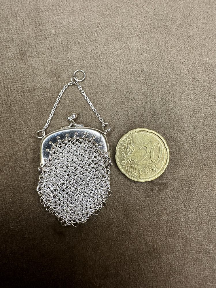 Medalha porta moedas em prata