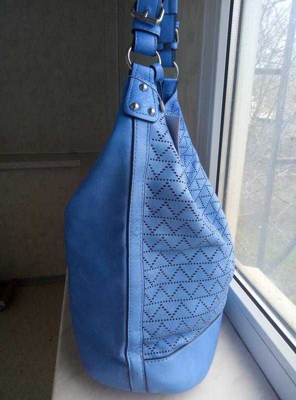 Женская сумка с перфорацией