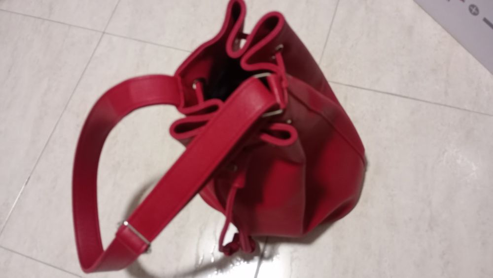 Mala vermelha em pele