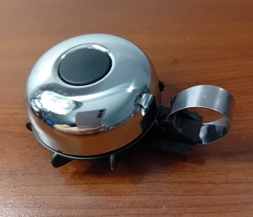Dzwonek rowerowy firmy Spanninga / Made in Holland / metalowy,srebrny.