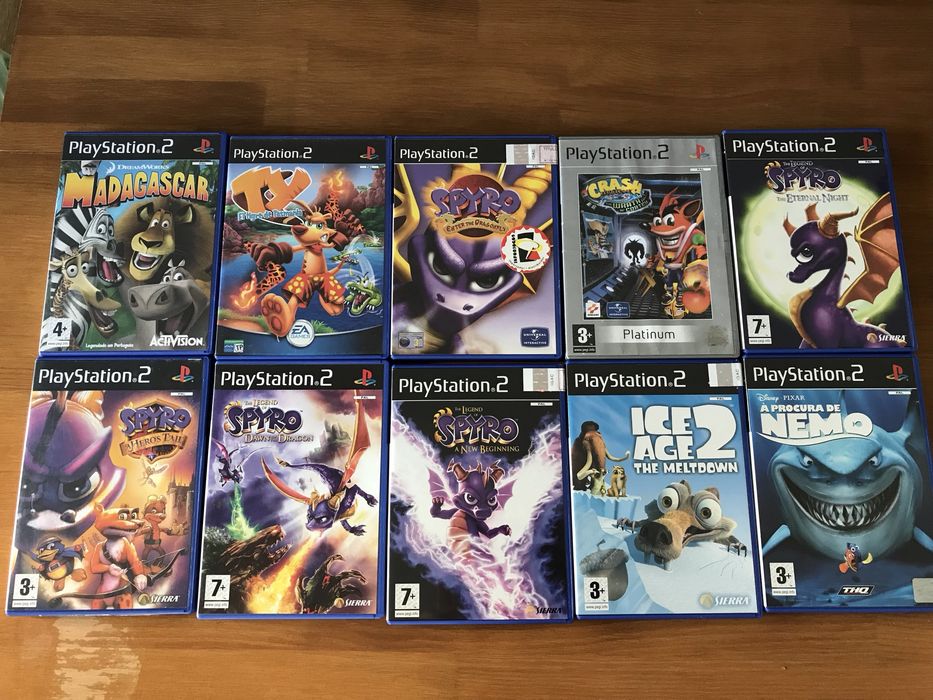 PS2 fat + comando + jogos