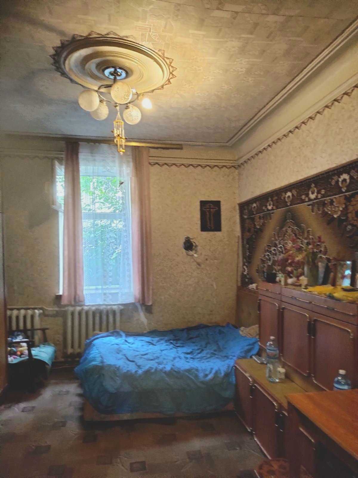 Продажа 1/2 ч. дома и земли  по ул.Нежинская ул. 29 (ст.м.Шулявка)