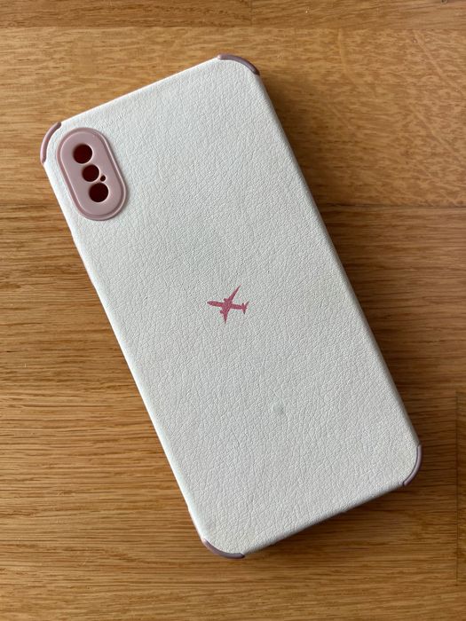 Capa de telemóvel iPhone X branca e rosa avião