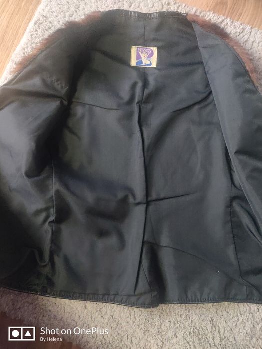 Шкіряна жилетка з хутром