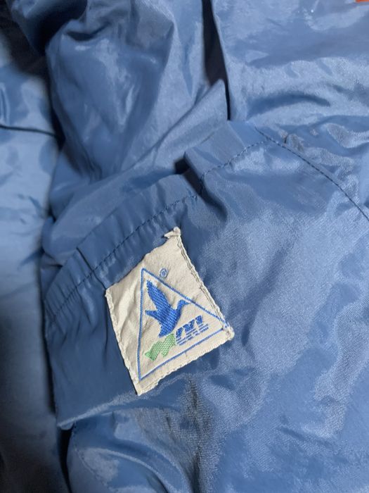 Kispo de penas de cor azul