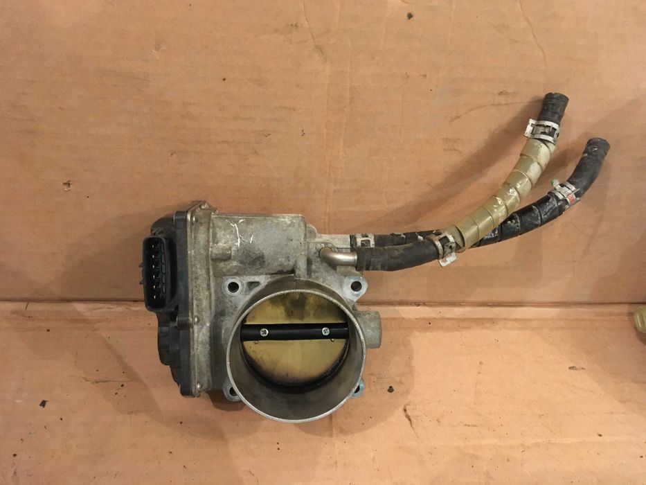 Дросільна заслінка в зборі 220300P050 Toyota Camry Lesus ES