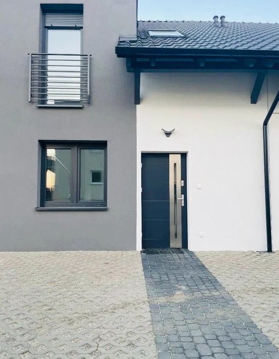 Wynajme nowy dom 100 m2 z ogrodkiem dwa miejsca pstojowe Leszno