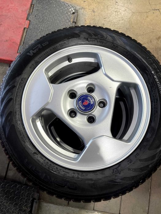 Saab - Sprzedam komplet felg z oponami zimowymi