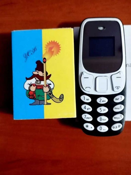 Малюк міні телефон.