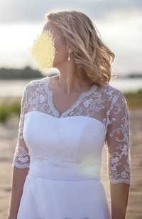 Biała suknia ślubna dla osoby z dużym biustem
