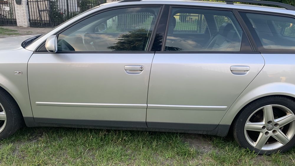 AUDI A4 B6 drzwi w kolor srebrne LY7W przód tył prawe lewe