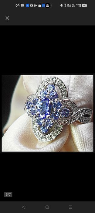 Sprzedam piękny srebny pierścionek z diamentami ta Tanzanitami+sertyf.