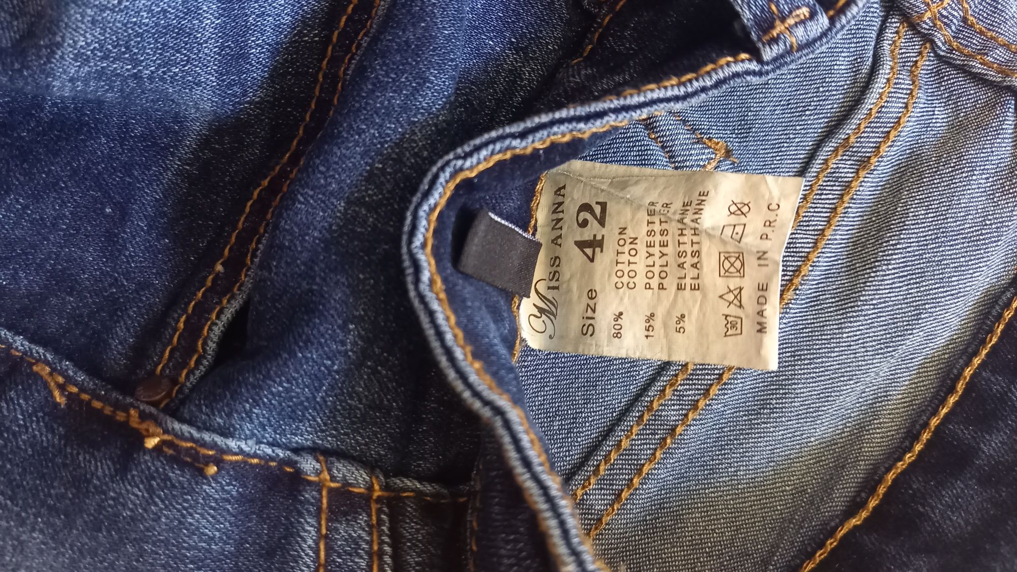 Spodnie jeans r.38/40 zdobione kwiaty