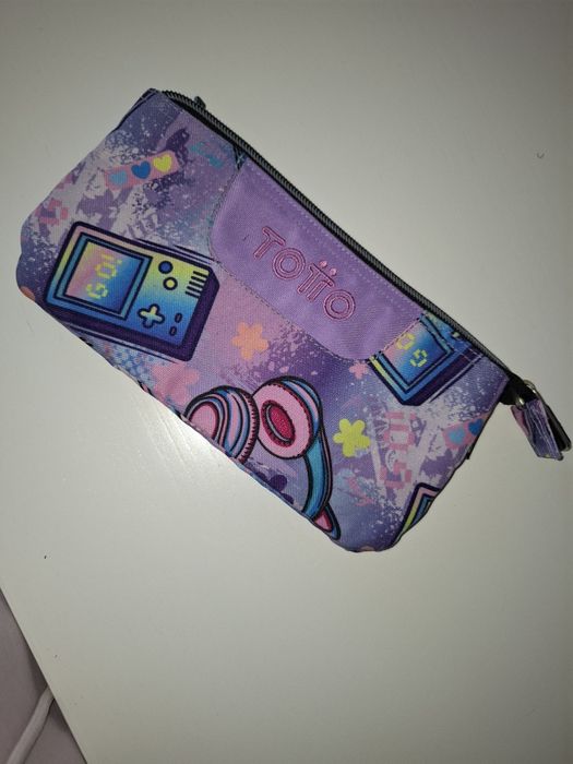 Mochila e estojo original Totto c/ ofertas de material escolar