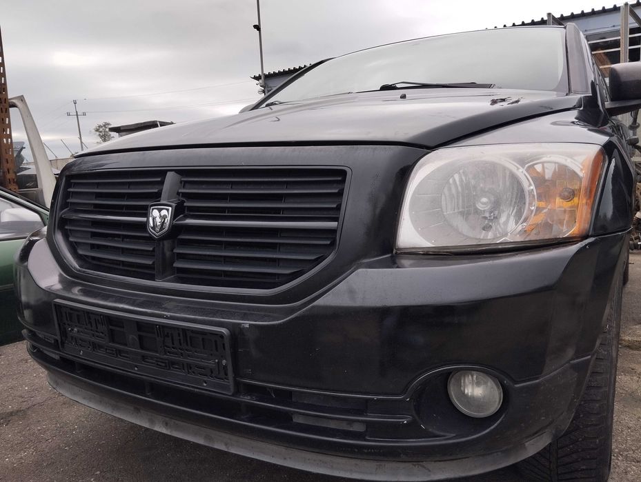 Dodge Caliber 2.0CRD 2006r.Lampa przednia lewa.