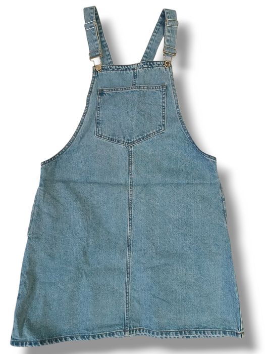 Жіночий джинсовий комбінезон