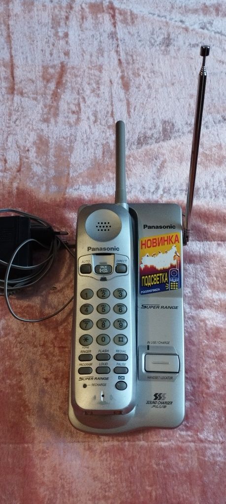 Радиотелефон Panasonic (до 50 метрів).)