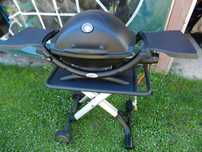 Grill gazowy Weber Q120 na stoliku