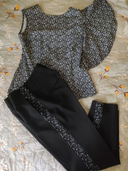 Жіночі костюми,комбези