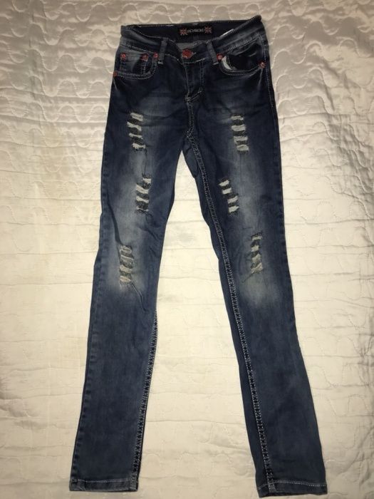 Modne jeansy 146/152