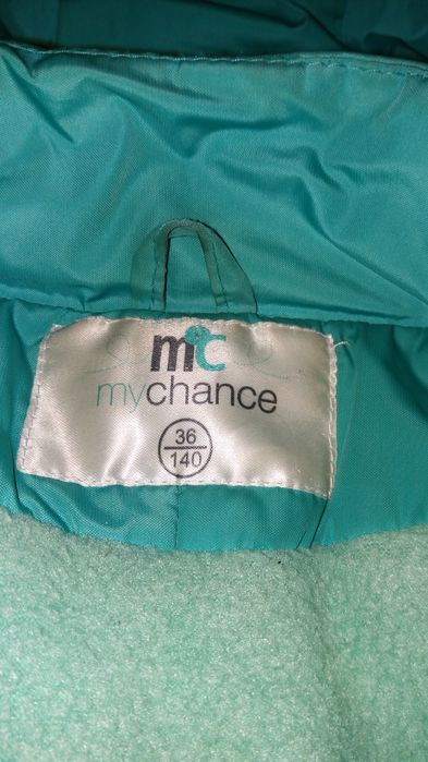 Пуховик на девочку 140