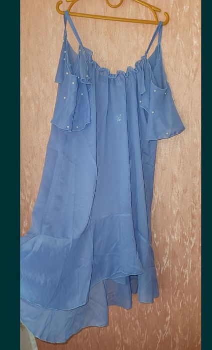 Туника парео с воланом на плечах и жемчугом 44р
Длина 88
Пог 44