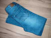 Spodnie jeans dla dziewczynki Sinsay 116