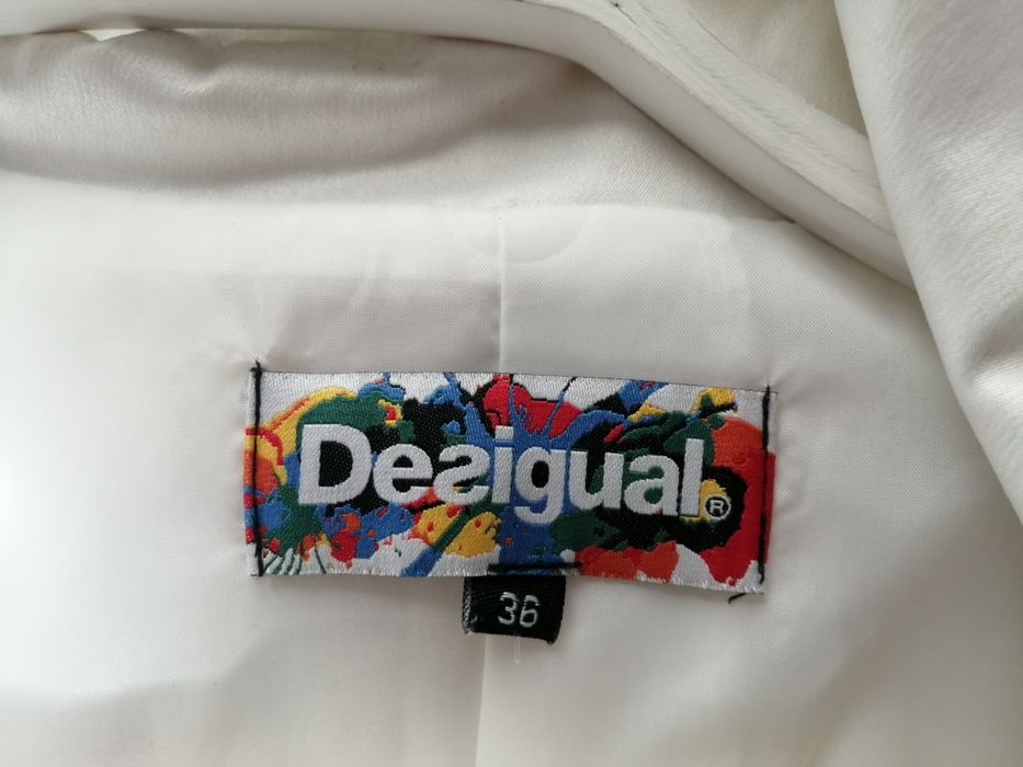 Gabardine marca desigual como nova