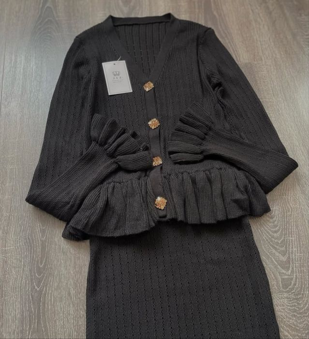 Трикотажна сукня міді