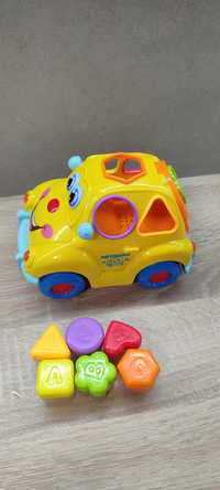 Музична розвиваюча іграшка машинка "Крихітка Автошка"