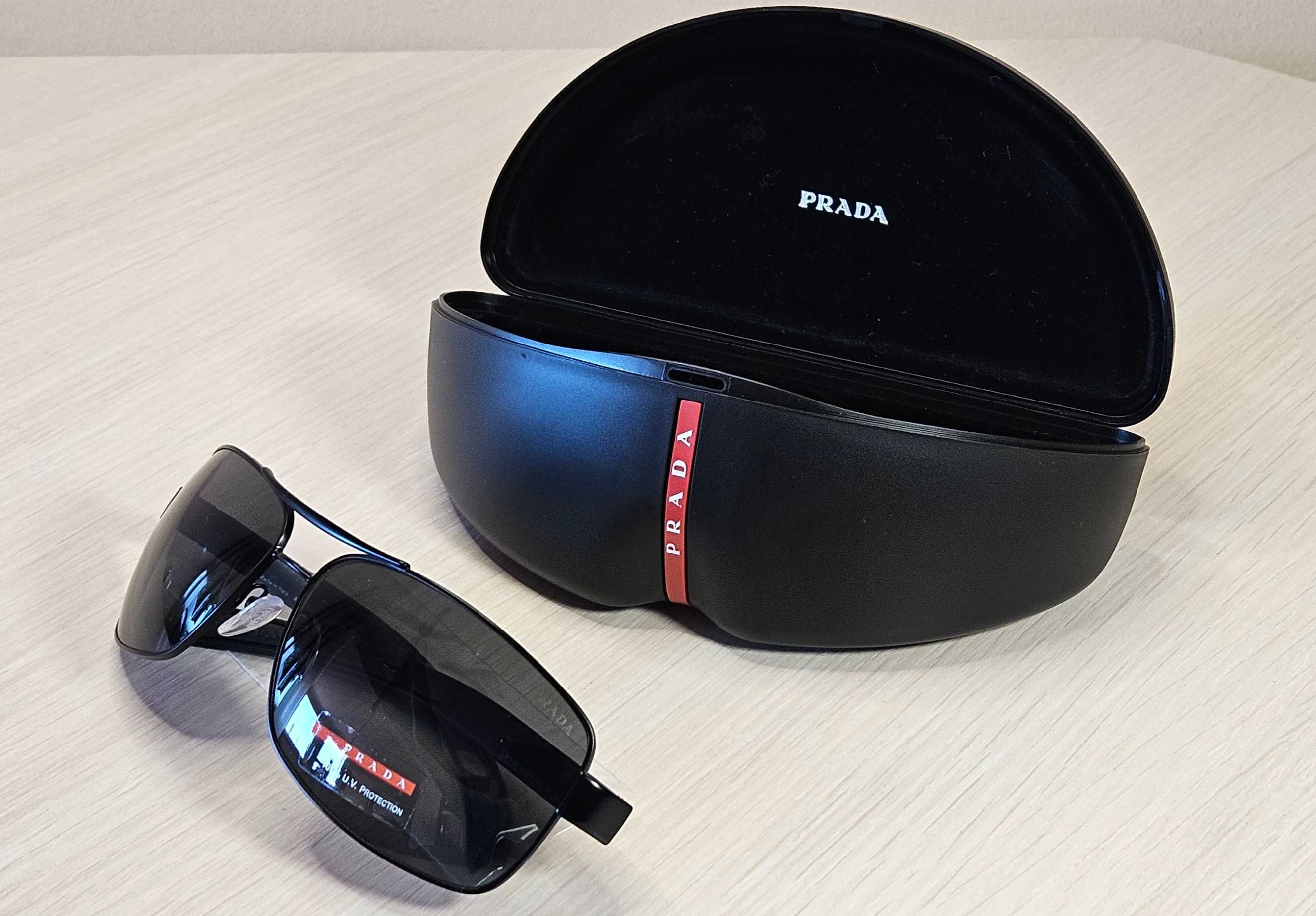 PRADA. Сонцезахисні окуляри PRADA SPS 54I 1BO-1A1 65 мм.