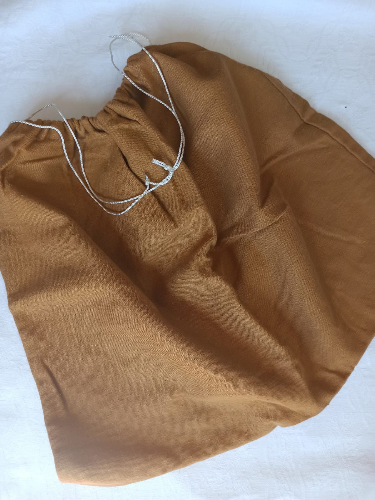 Saco de pano amarelo torrado com fio