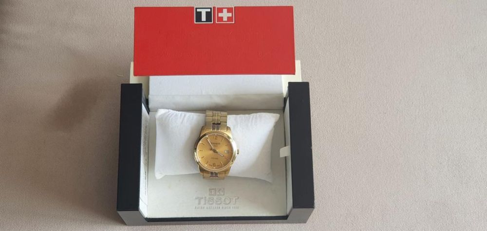 Zegarek męski Tissot złoty pudełko papiery