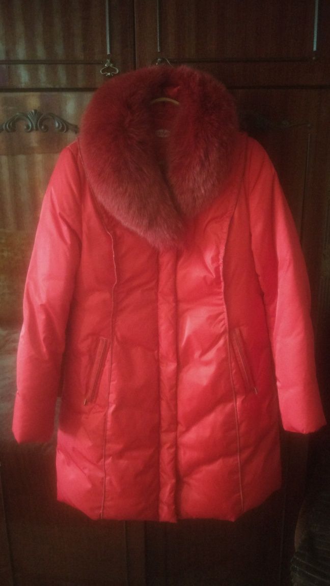 Продам Женский пуховик