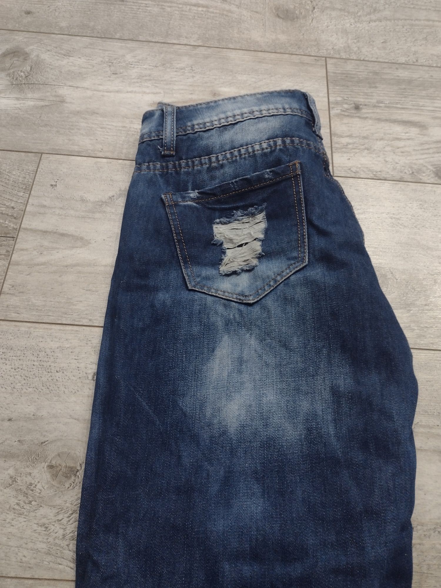 Spodnie jeansy damskie M