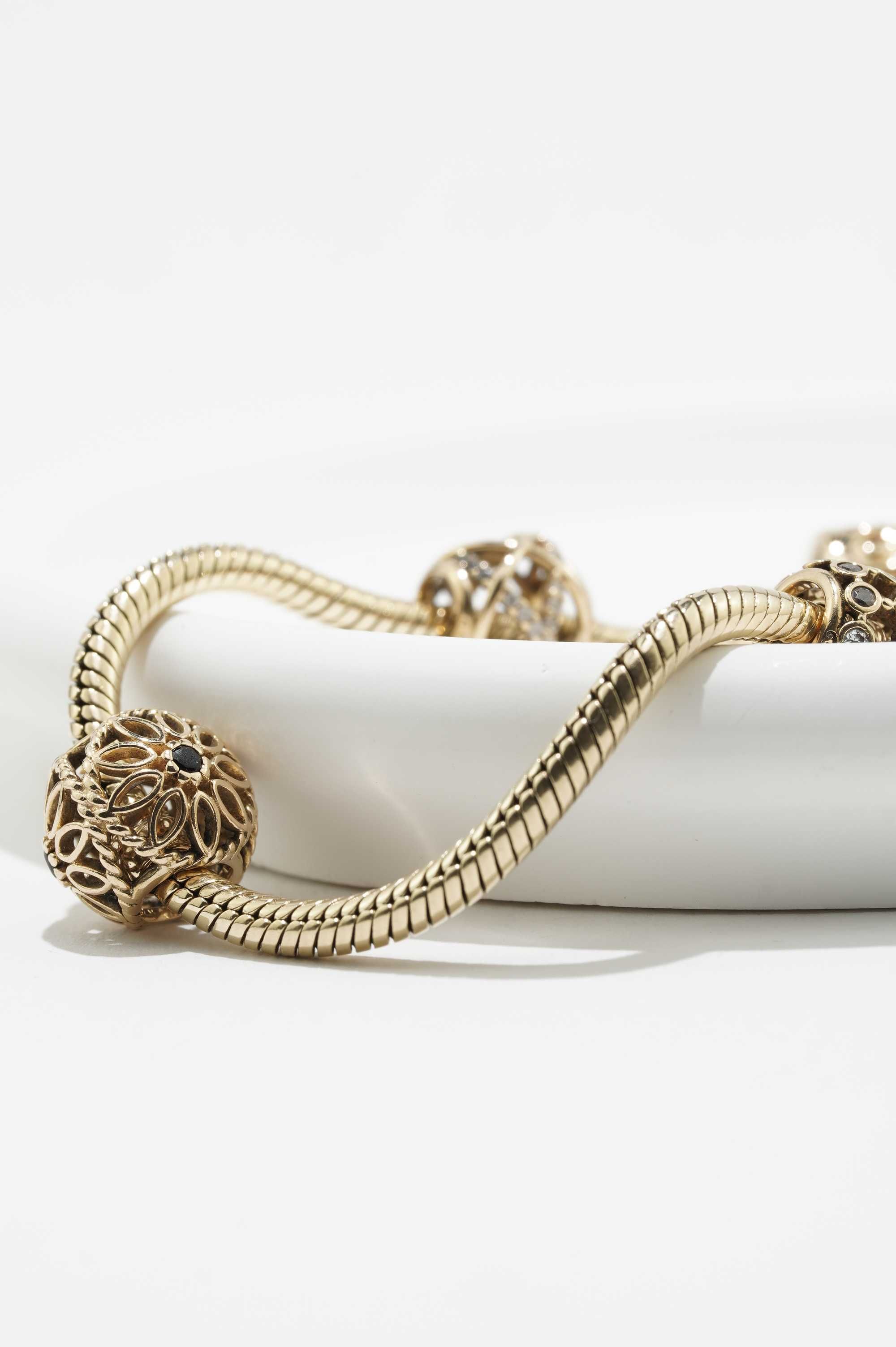 Złota bransoletka Pandora 14K 22,65g