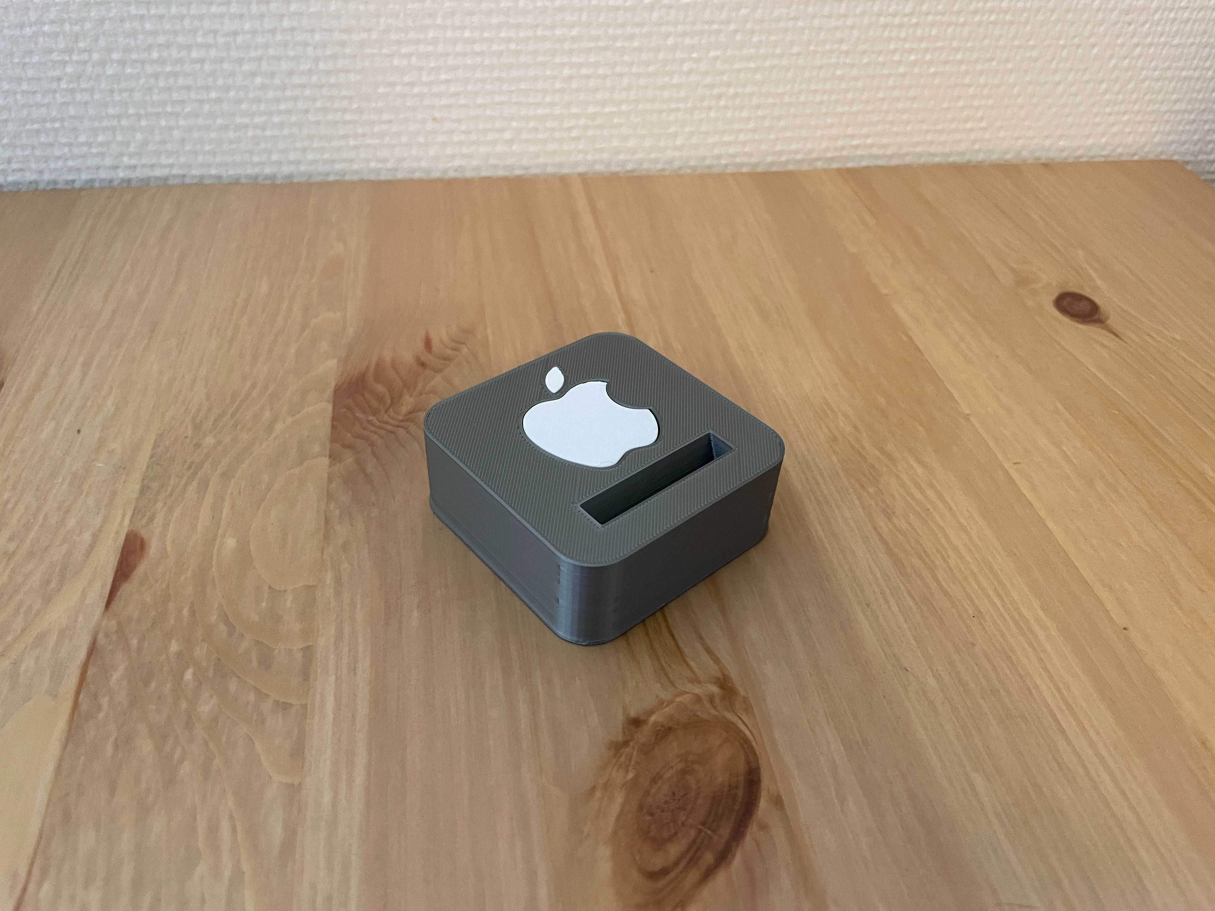 Podstawka pod pilot do AppleTV srebrny-bialy