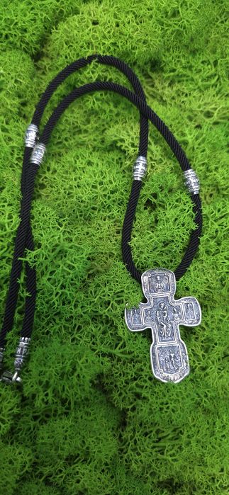 Срібний хрест на шовковому шнурку