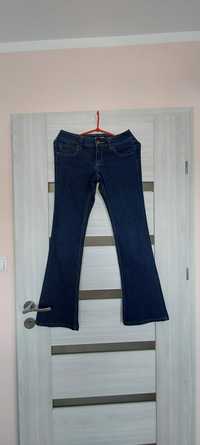 Spodnie jeansowe dżinsowe xs denim dzwony biodrowka