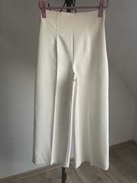 Kremowe spodnie z wysokim stanem z szeroką nogawką Zara r.S