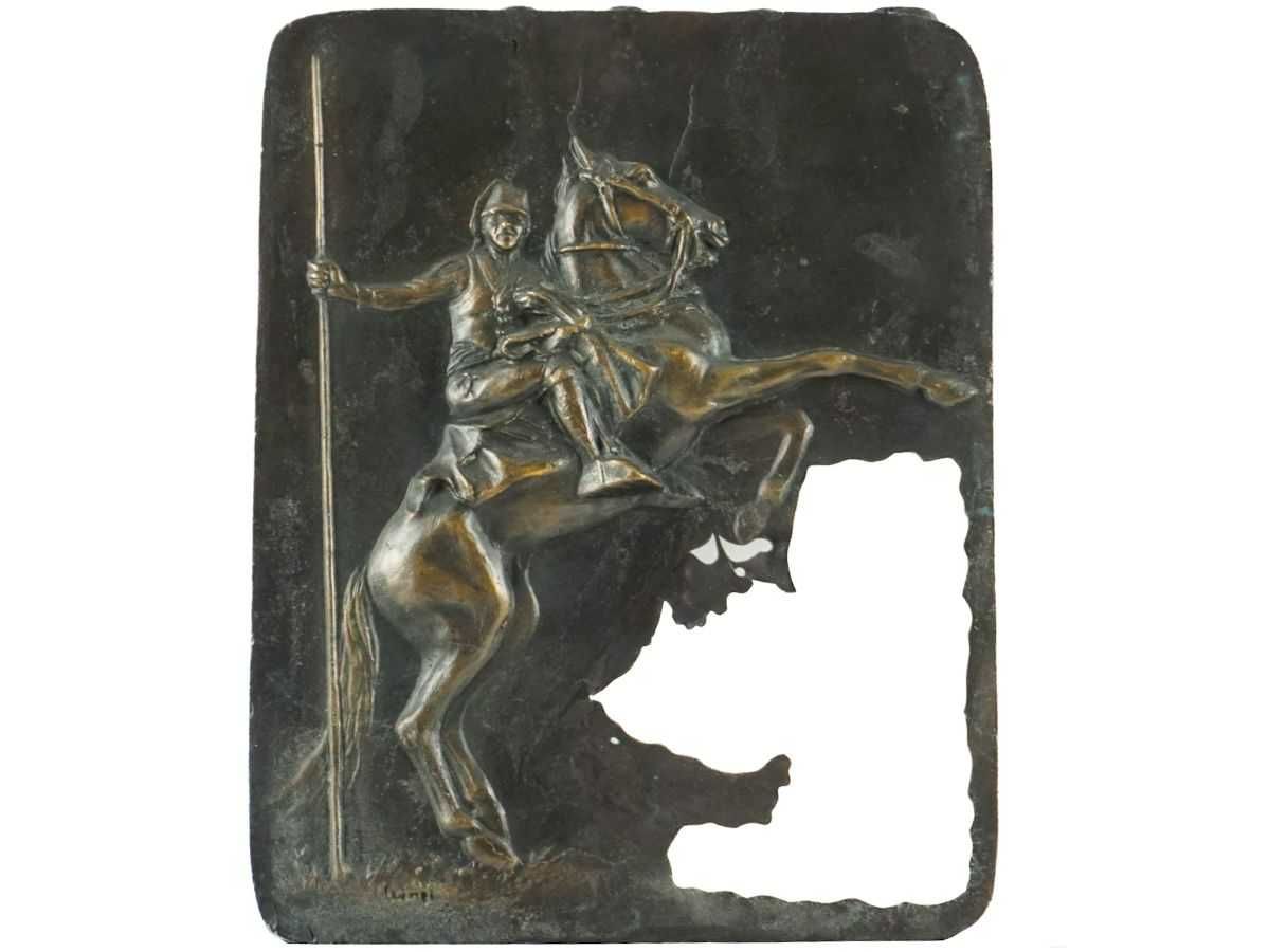 Escultura em ferro de cabeça de cavalo