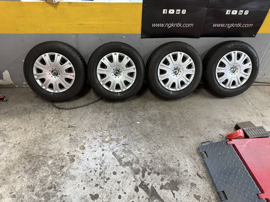 Koła SKODA  R15 z oponami zimowymi 195/65R16 KOŁPAKI