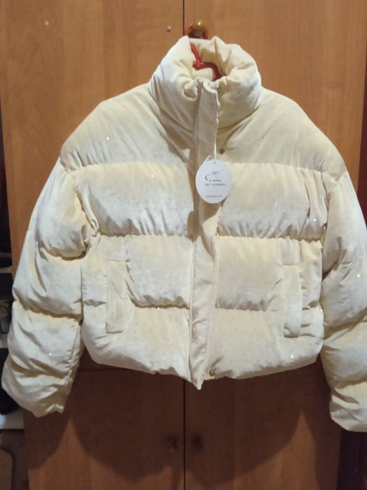 Пуховик 50-52р укороченный, новый.