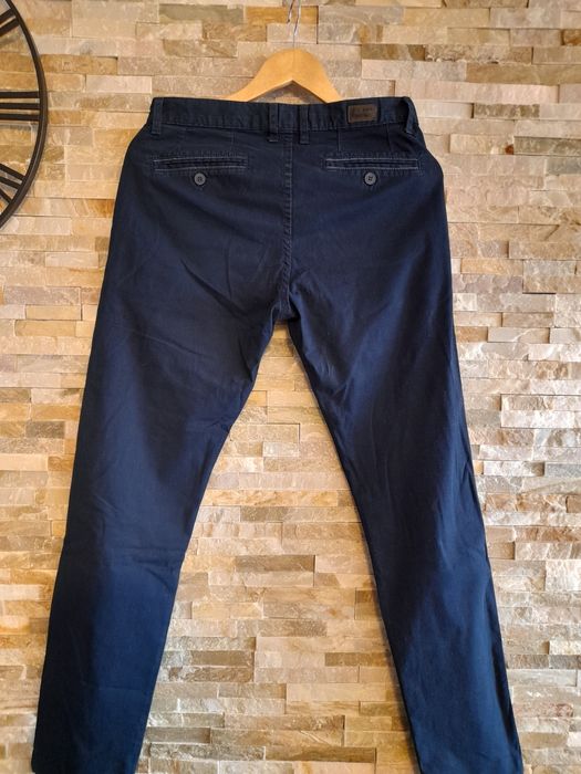 Męskie spodnie granatowe Stanley casual 31 M
Granatowe