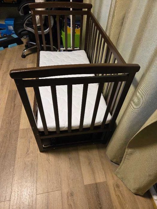 Дитяче дерев'яне ліжко трансформер