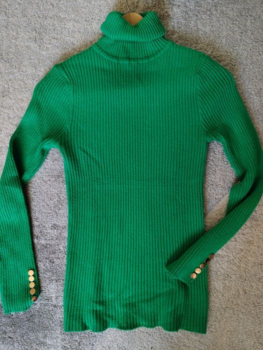 Śliczny zielony golf