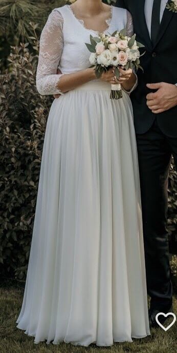 Suknia ślubna plus dwa welony