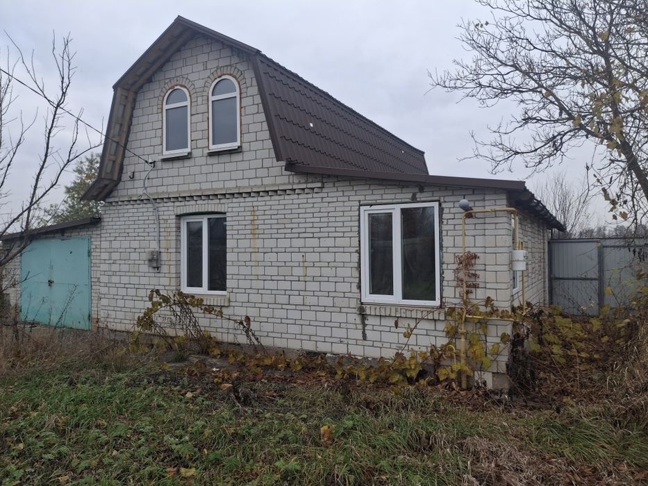 Земельна ділянка з будинком