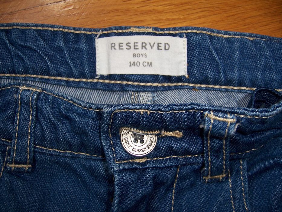 chłopięce spodnie jeansowe RESERVED rozm 140