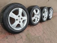 Oryginalne Felgi 15" Mazda 2 Ford 4x108 ET52.5 + 195.55.15 Letnie